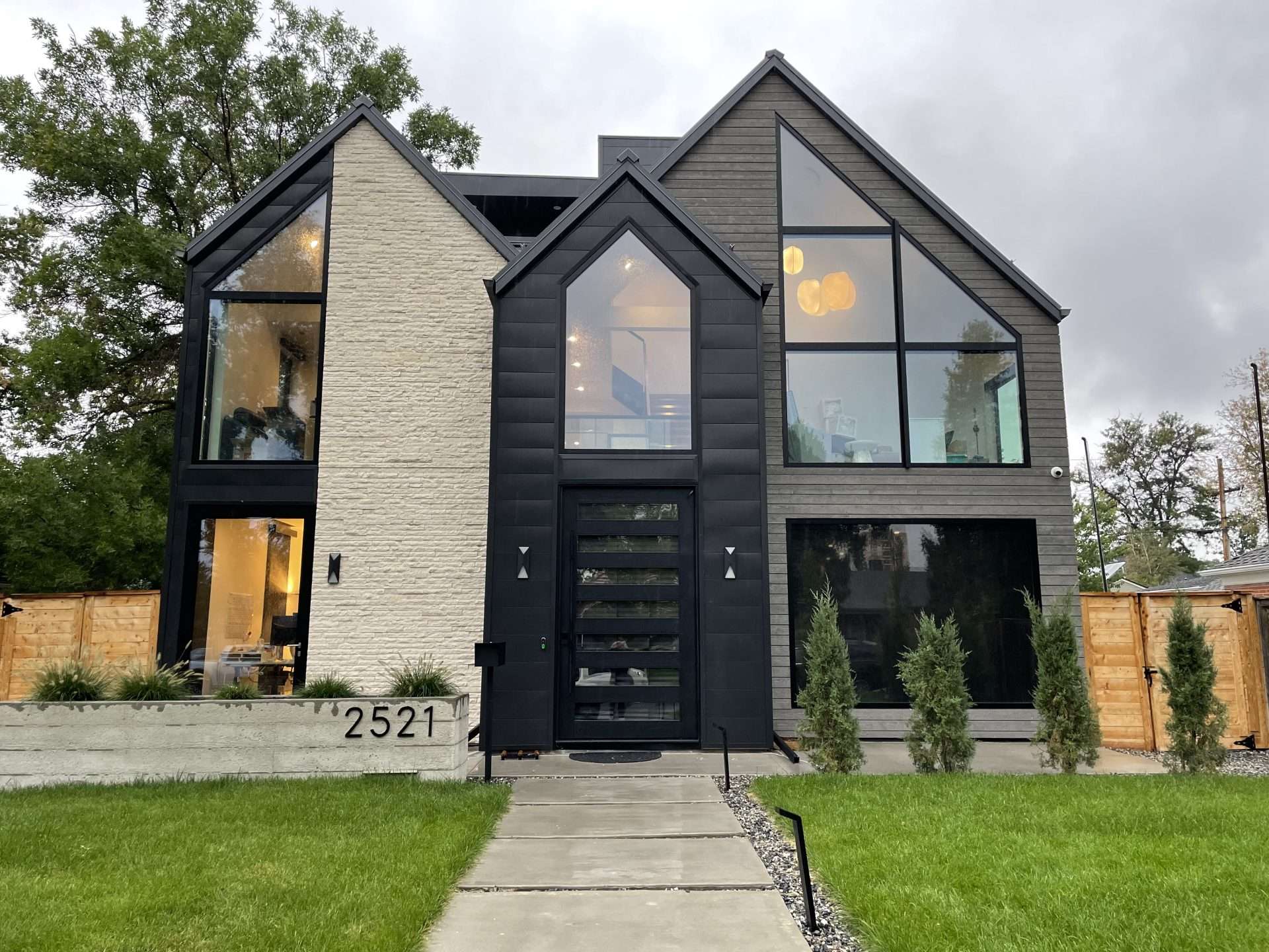 Outside view of modern home with aluminum doors