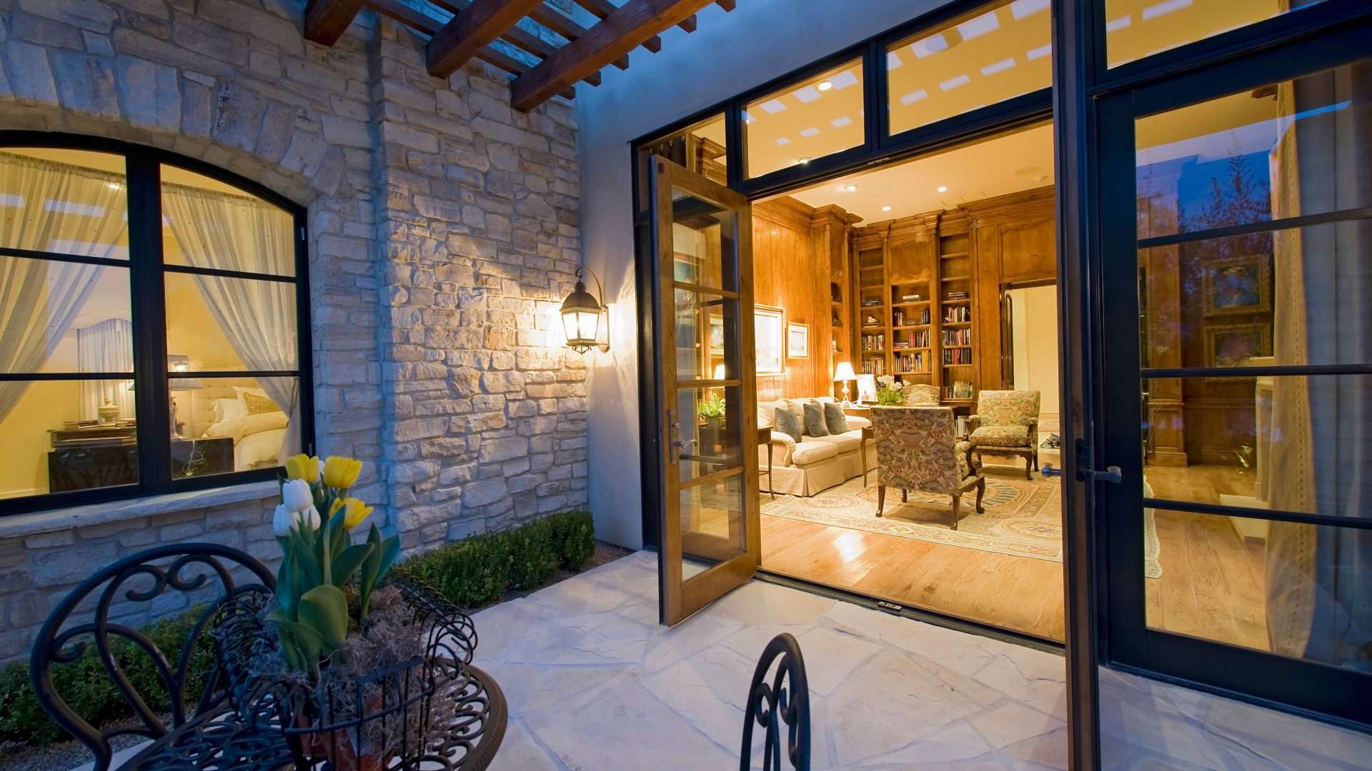 Close exterior view of double patio doors on a contemporary home