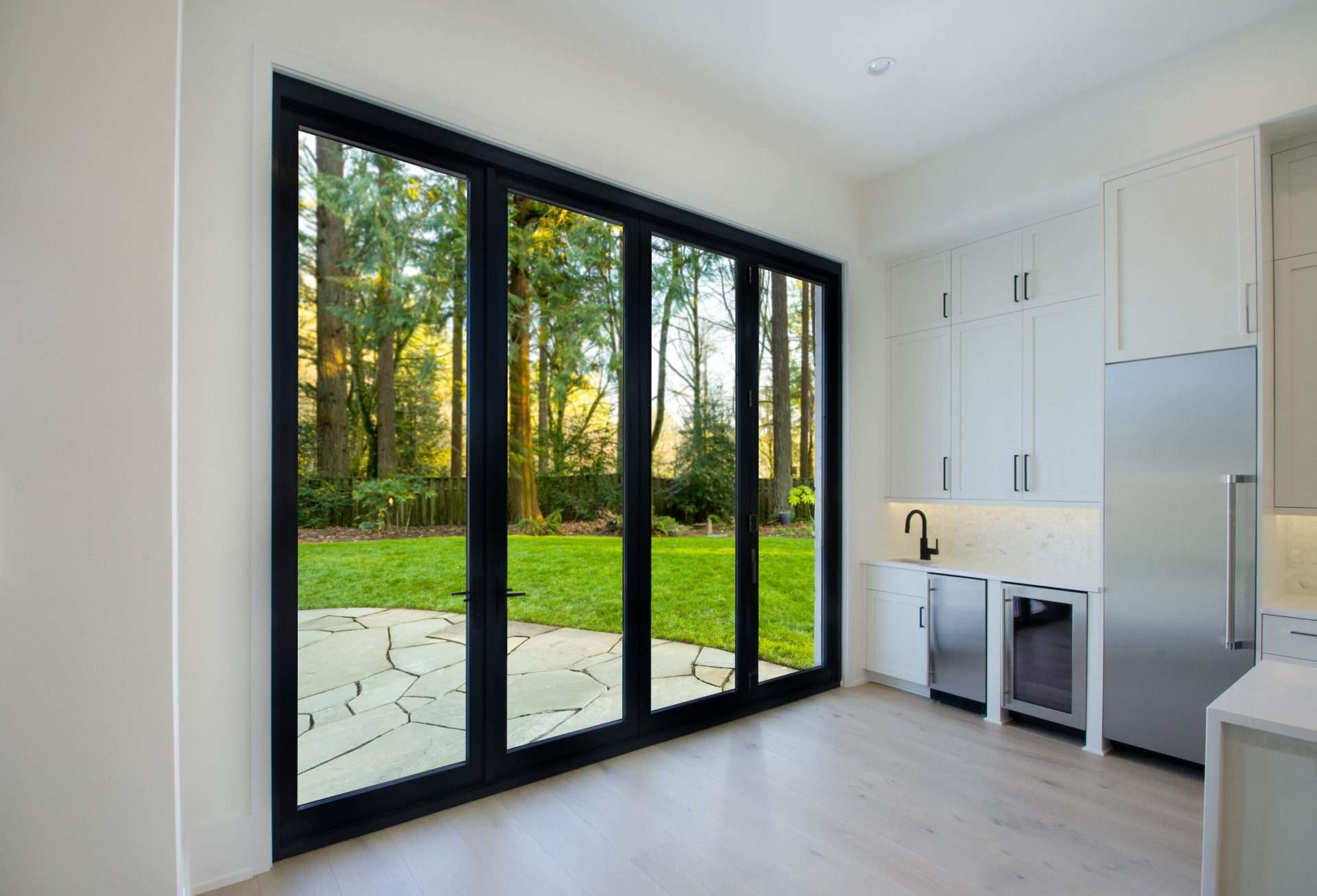Aluminum patio doors on Bedford, NY home supplied by Rockman Windows & Doors