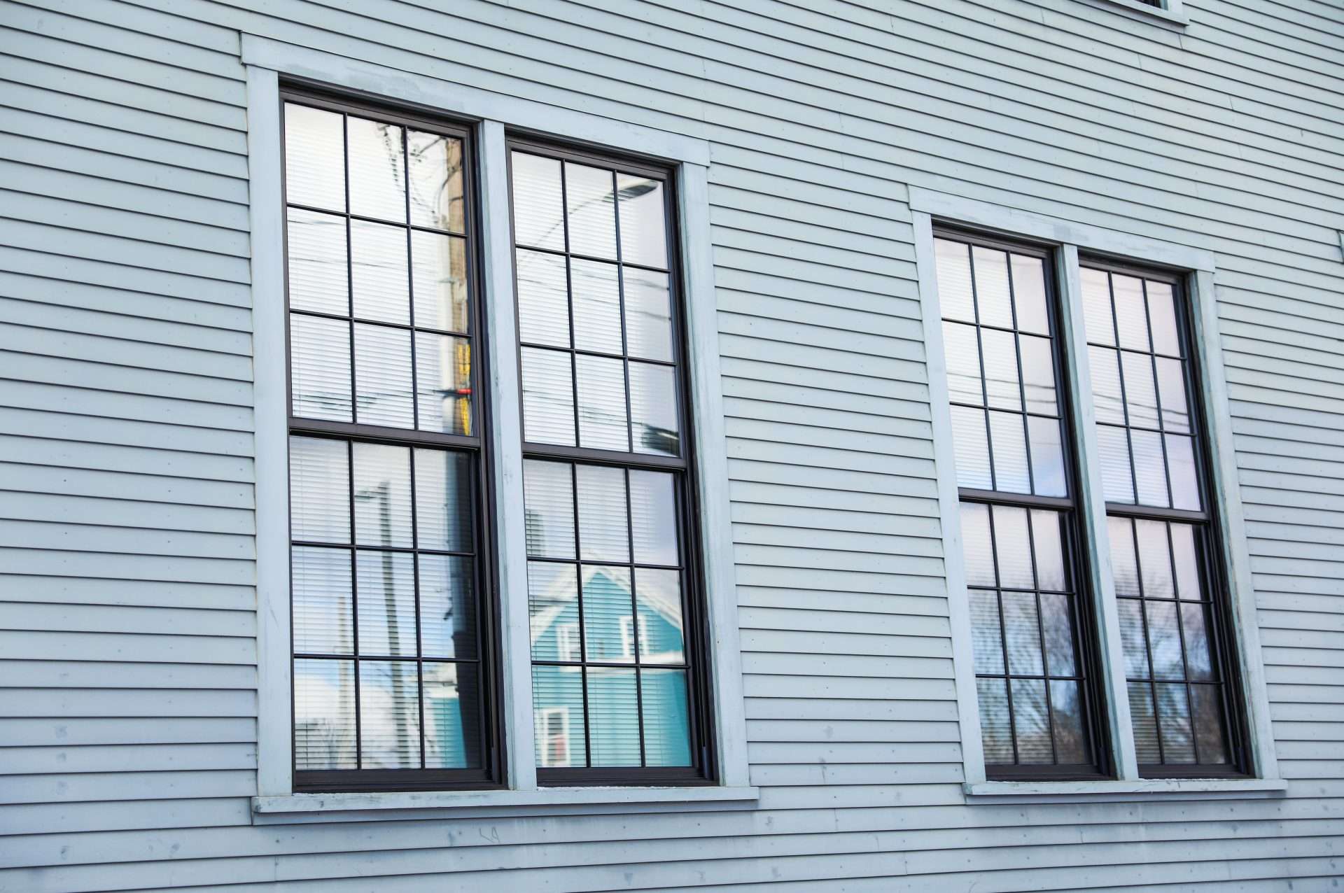 Large double-hung windows on a house