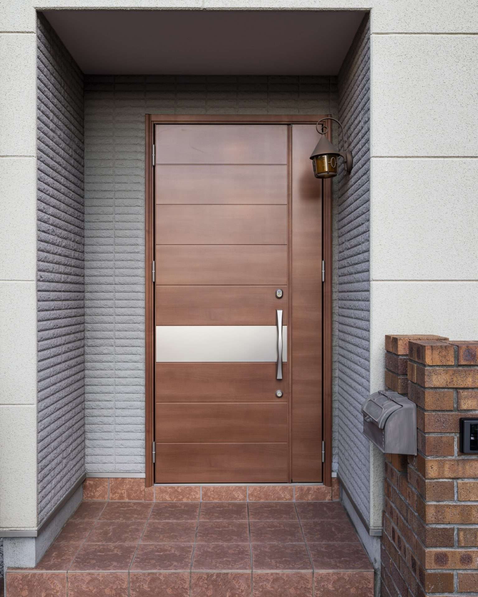 Excellent Doors In Cold Spring, NY | Rockman Windows and Doors A modern wood door at the entrance of a brick house.