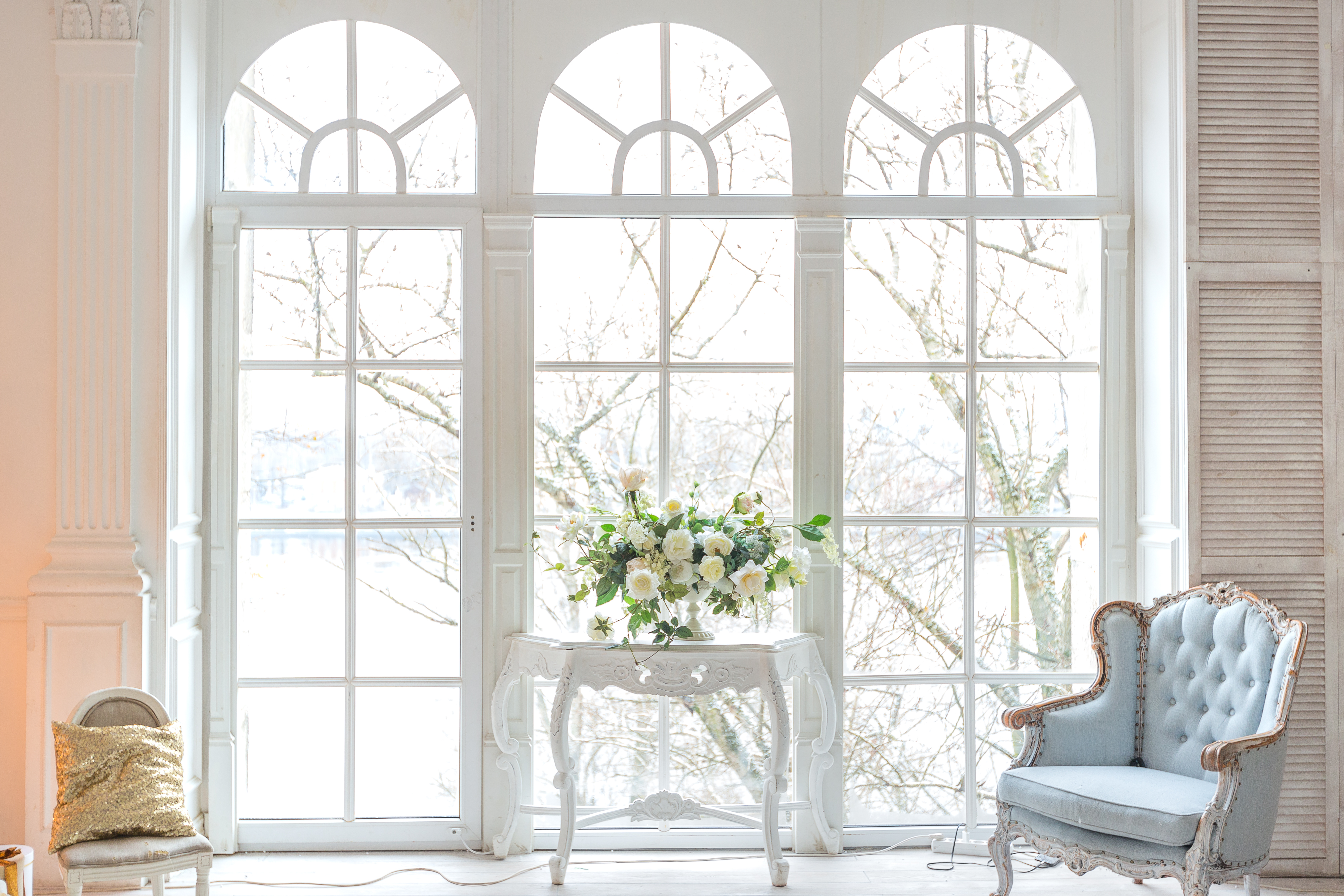Gorgeous Custom Windows In Scarsdale, NY | Rockman Windows & Doors Close-up of custom, white-framed windows in a large, high-ceiling room.